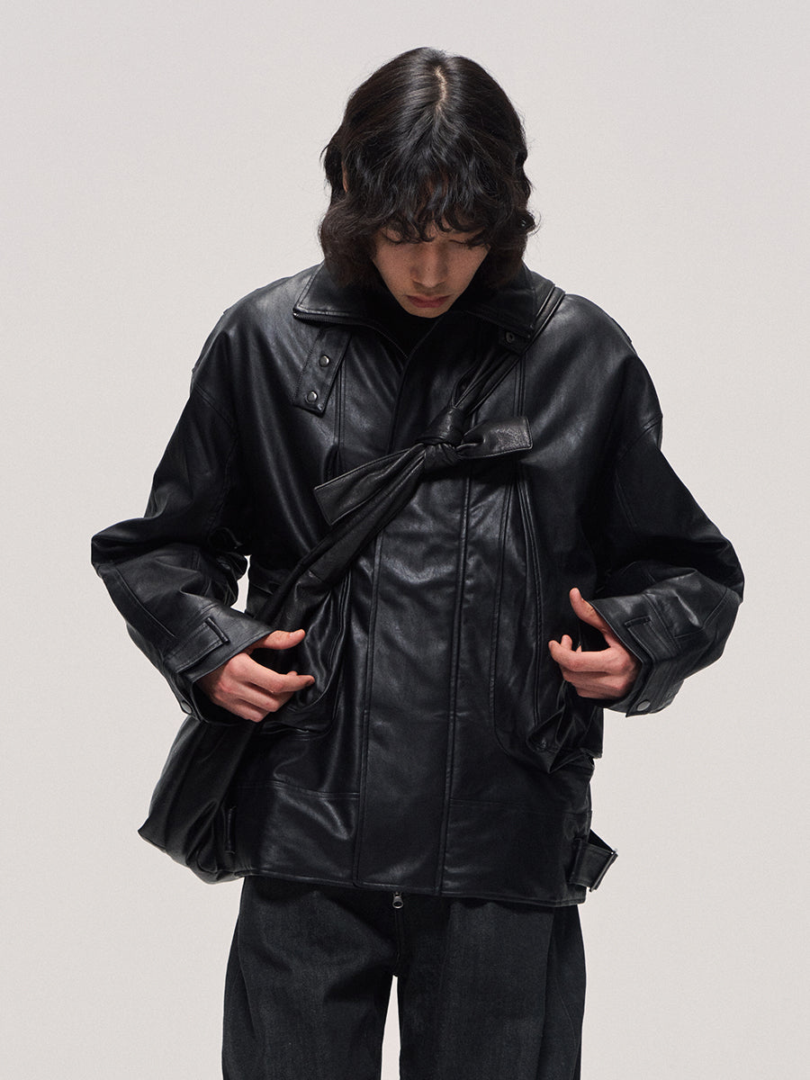 Damaged mid-length leather jacket