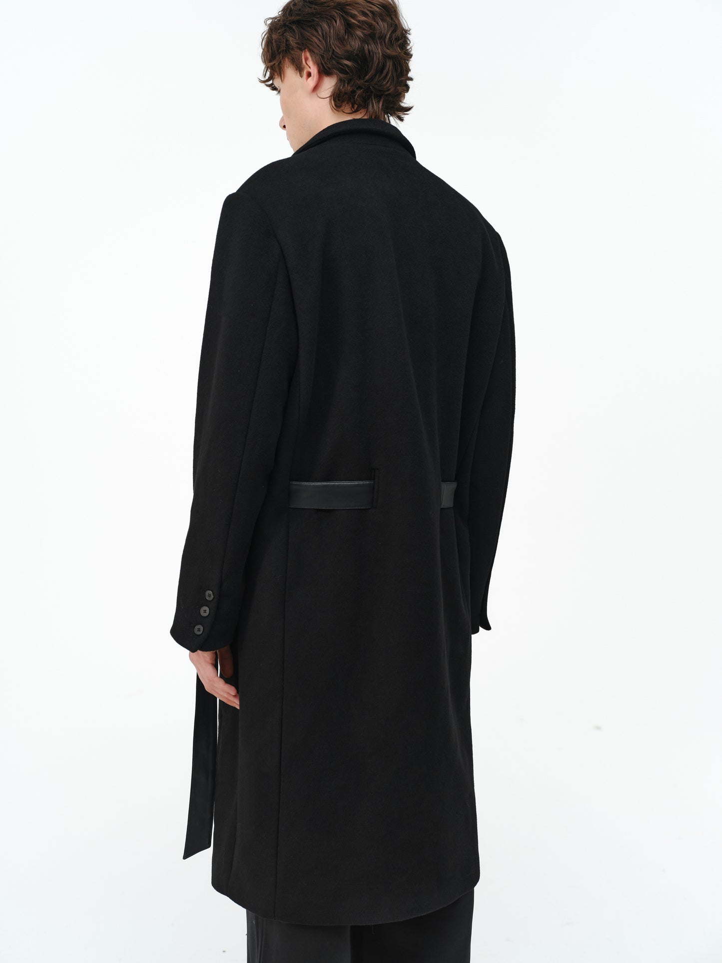 Overcoat with a leather belt