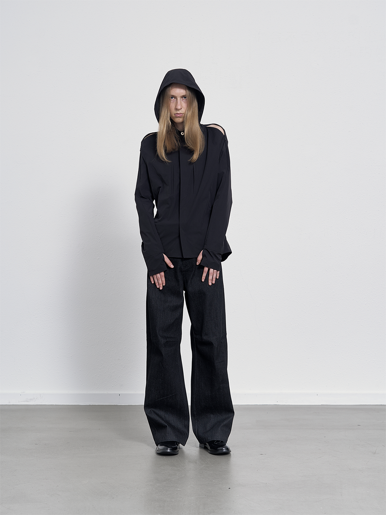 Water-repellent shirt with removable hood