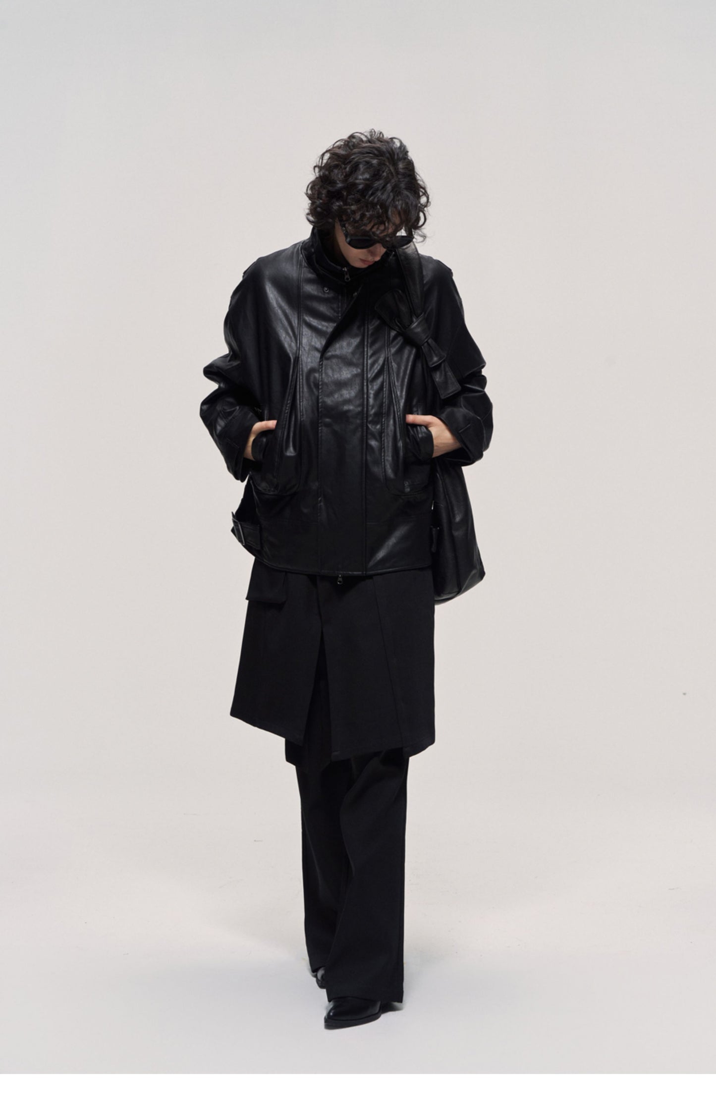 Damaged mid-length leather jacket