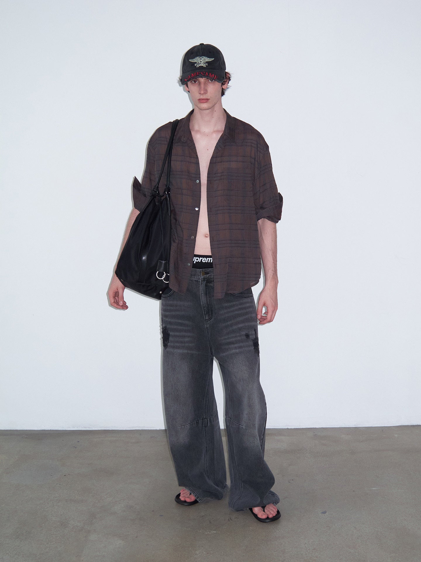 Distressed Patchwork Curved-Cut Denim Pants