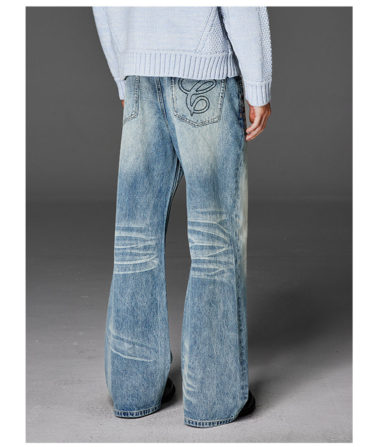 Embroidered washed jeans