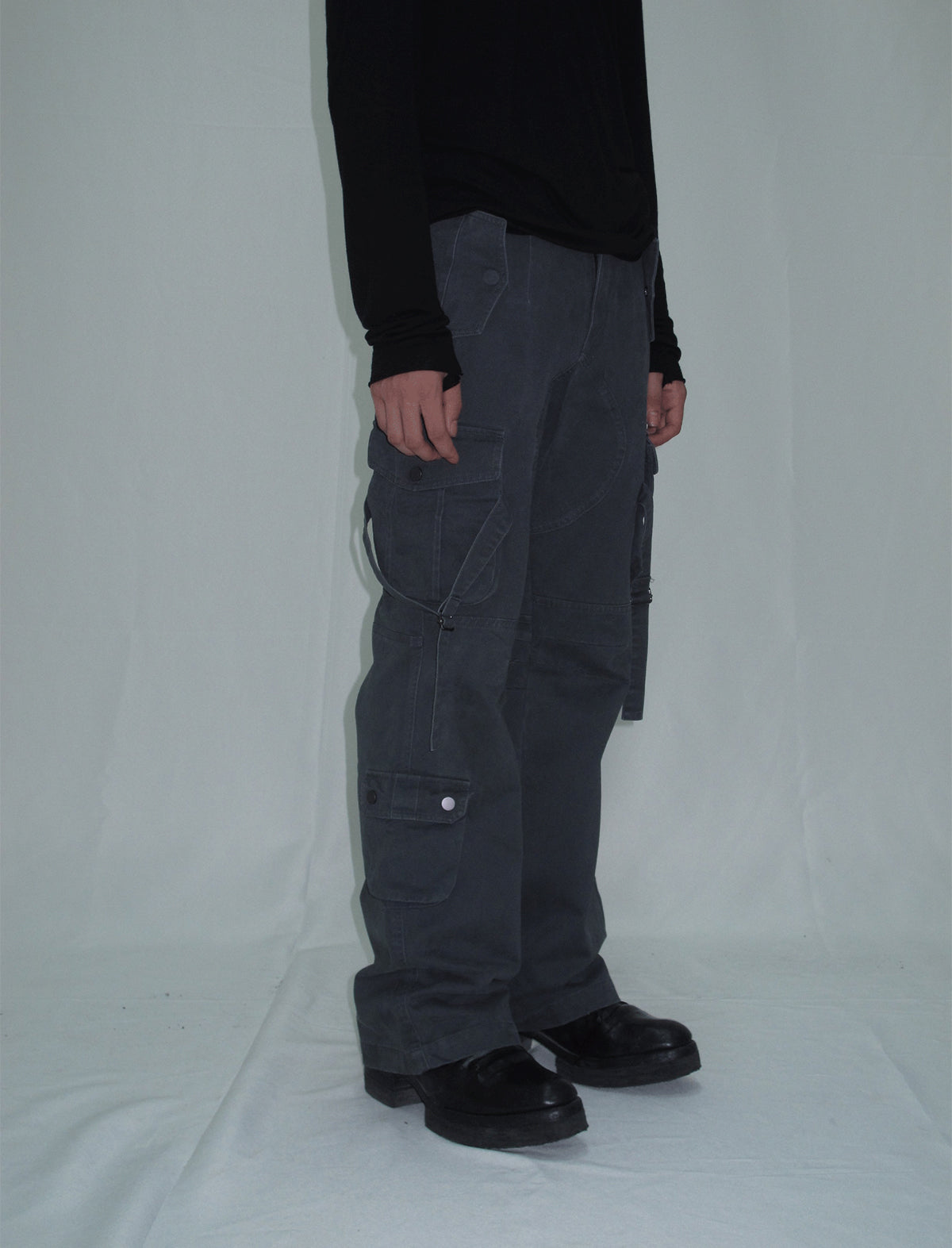 Cargo pants with multi-pocket straps