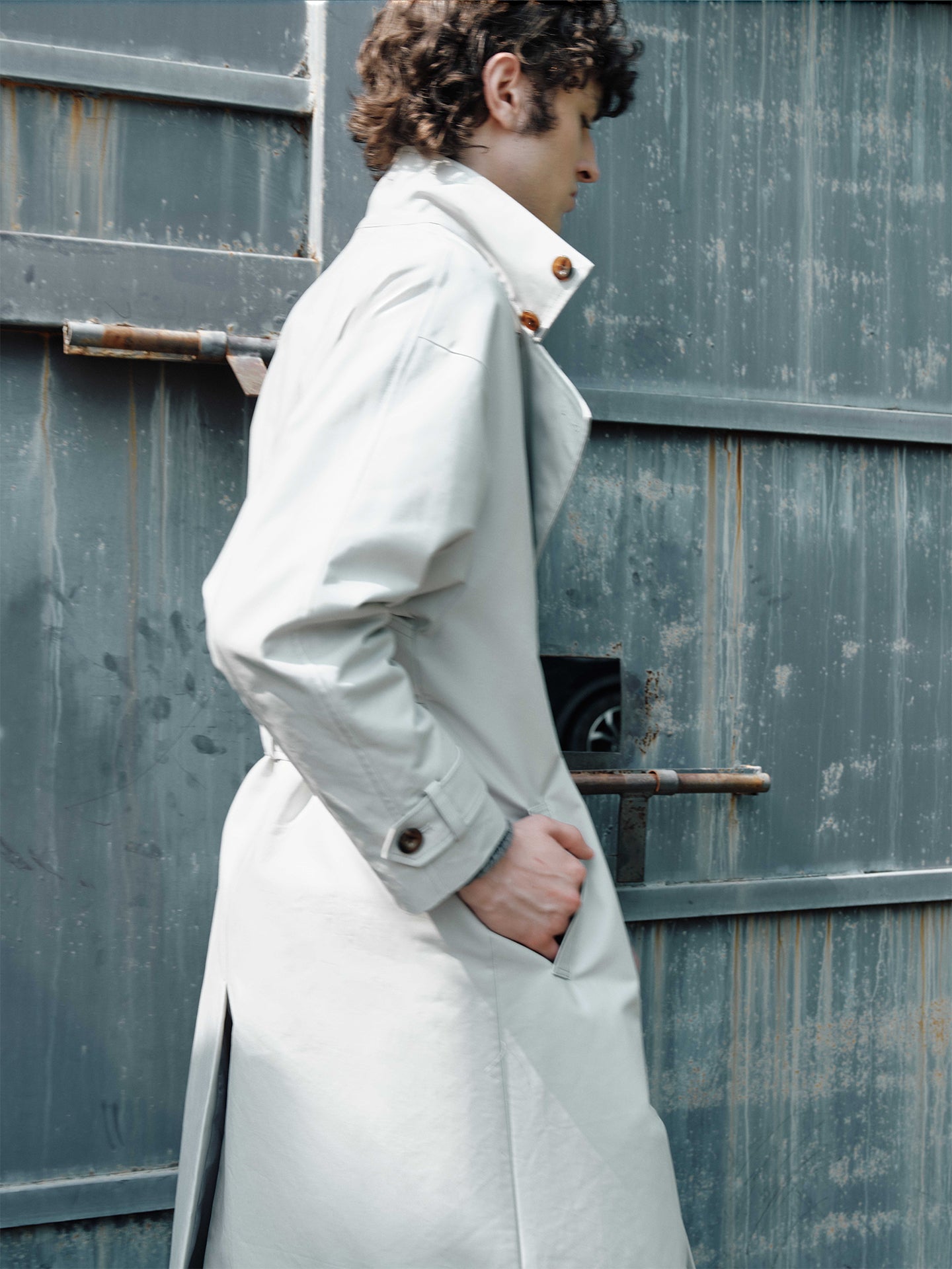 Coat with adjustable belt