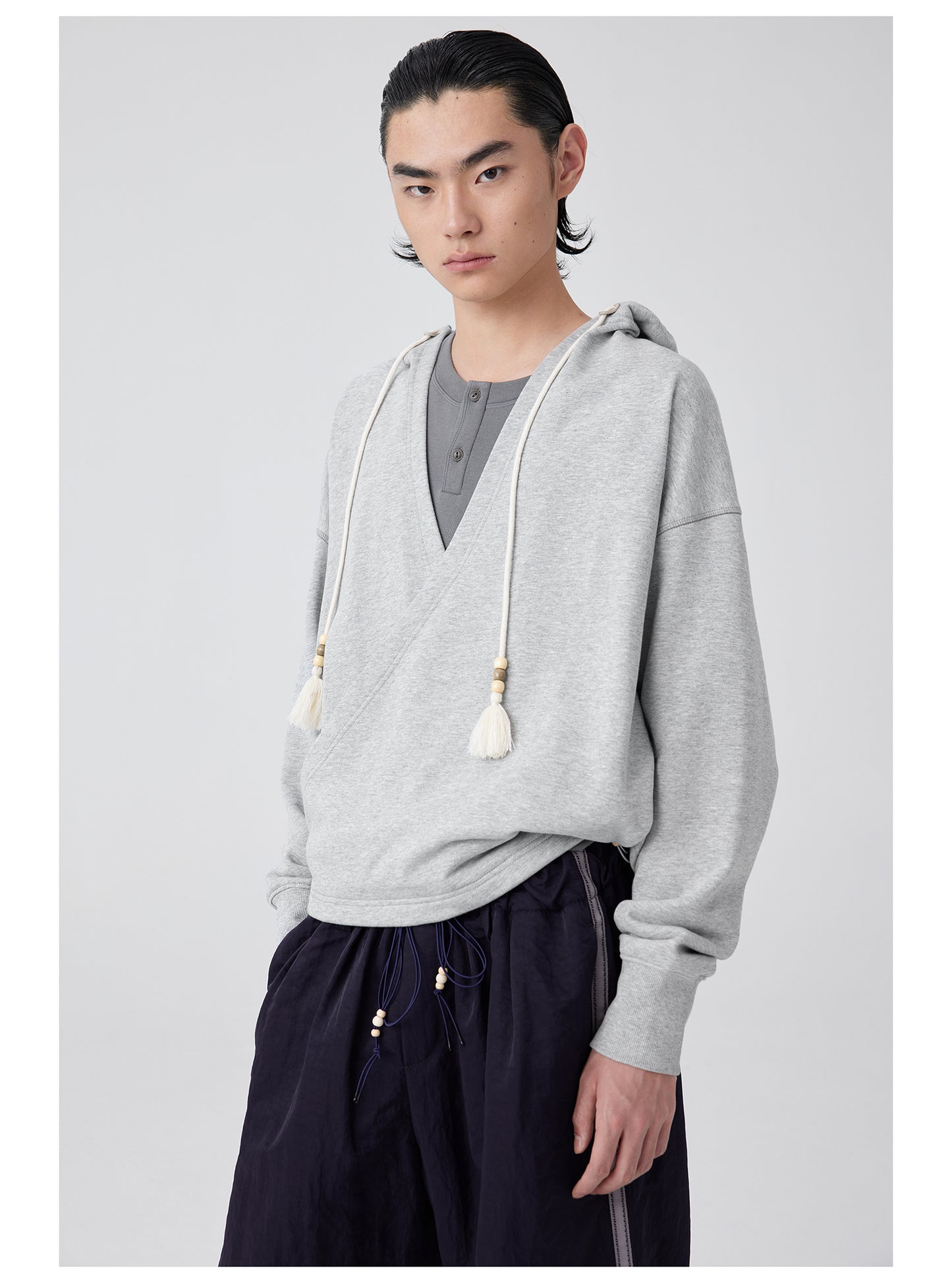 Overlap slant placket hooded sweatshirt