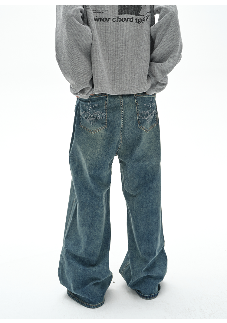 Washed damaged denim pants