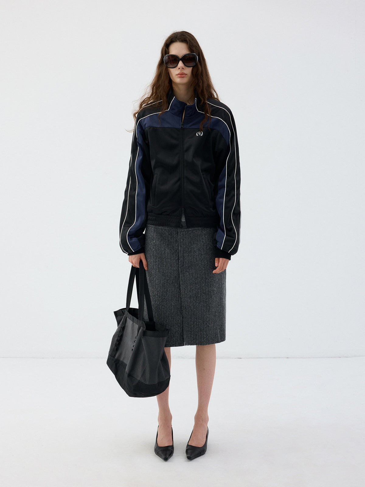 Jacket with a stand-up collar and a zipper