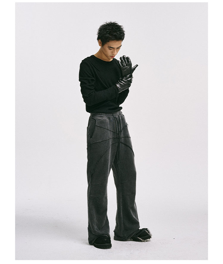 Raw-edge heavy-wash sweatpants