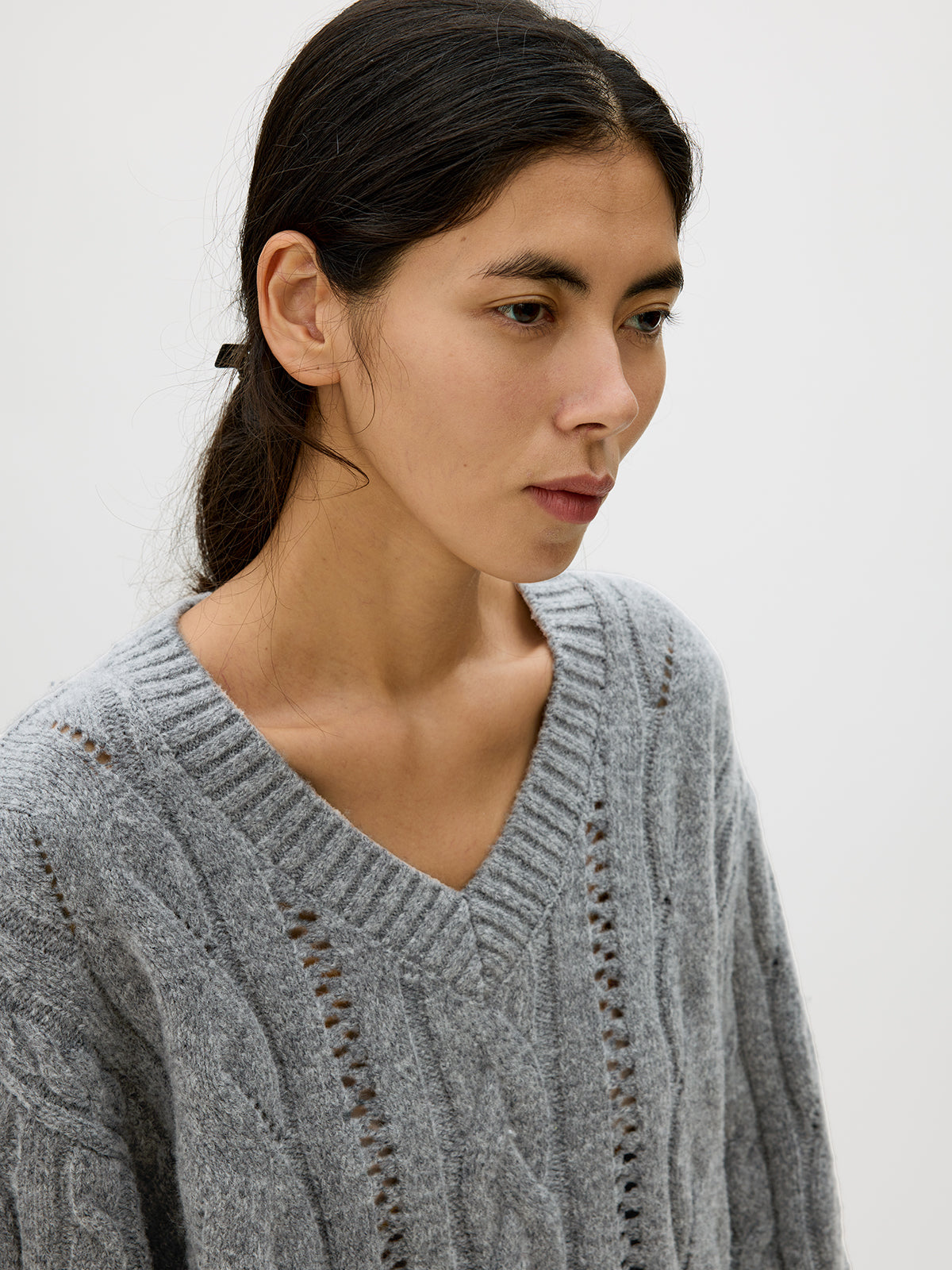 V-neck cable knit sweater