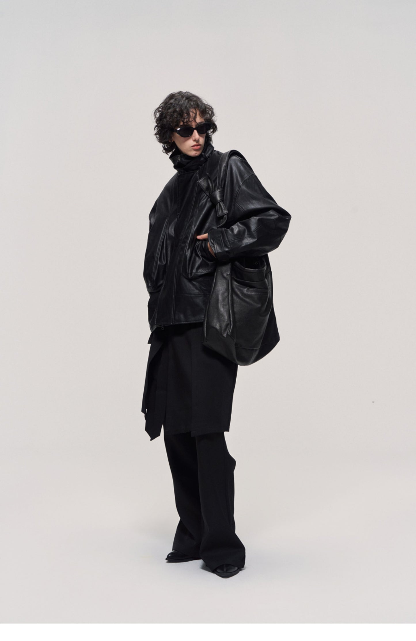 Damaged mid-length leather jacket