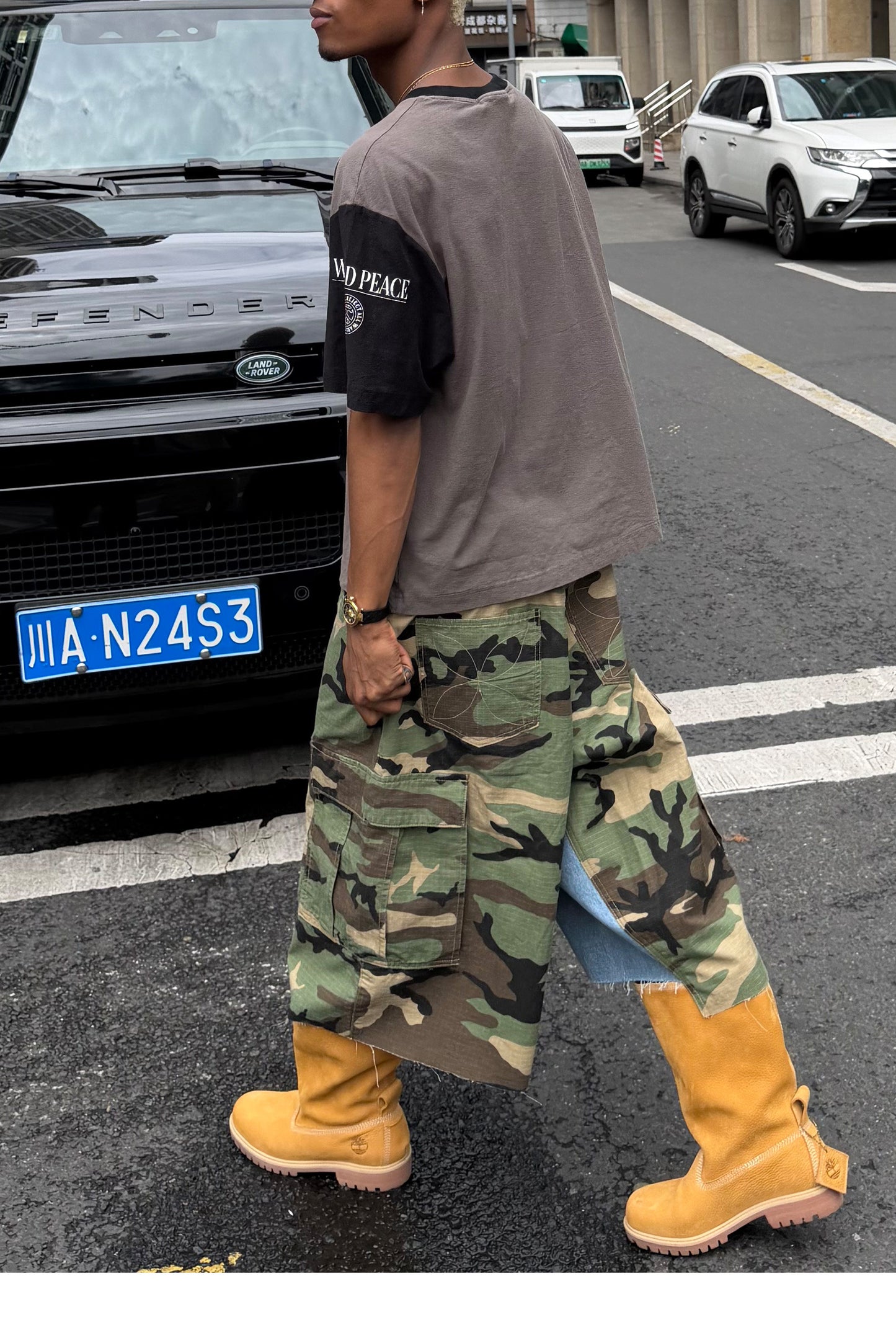 Camouflage-Print Distressed Patchwork Shorts