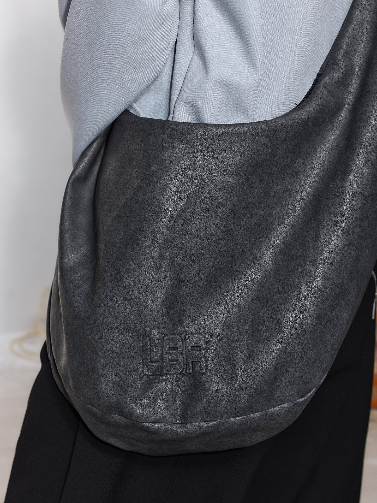Embossed adjustable shoulder strap PU leather bag