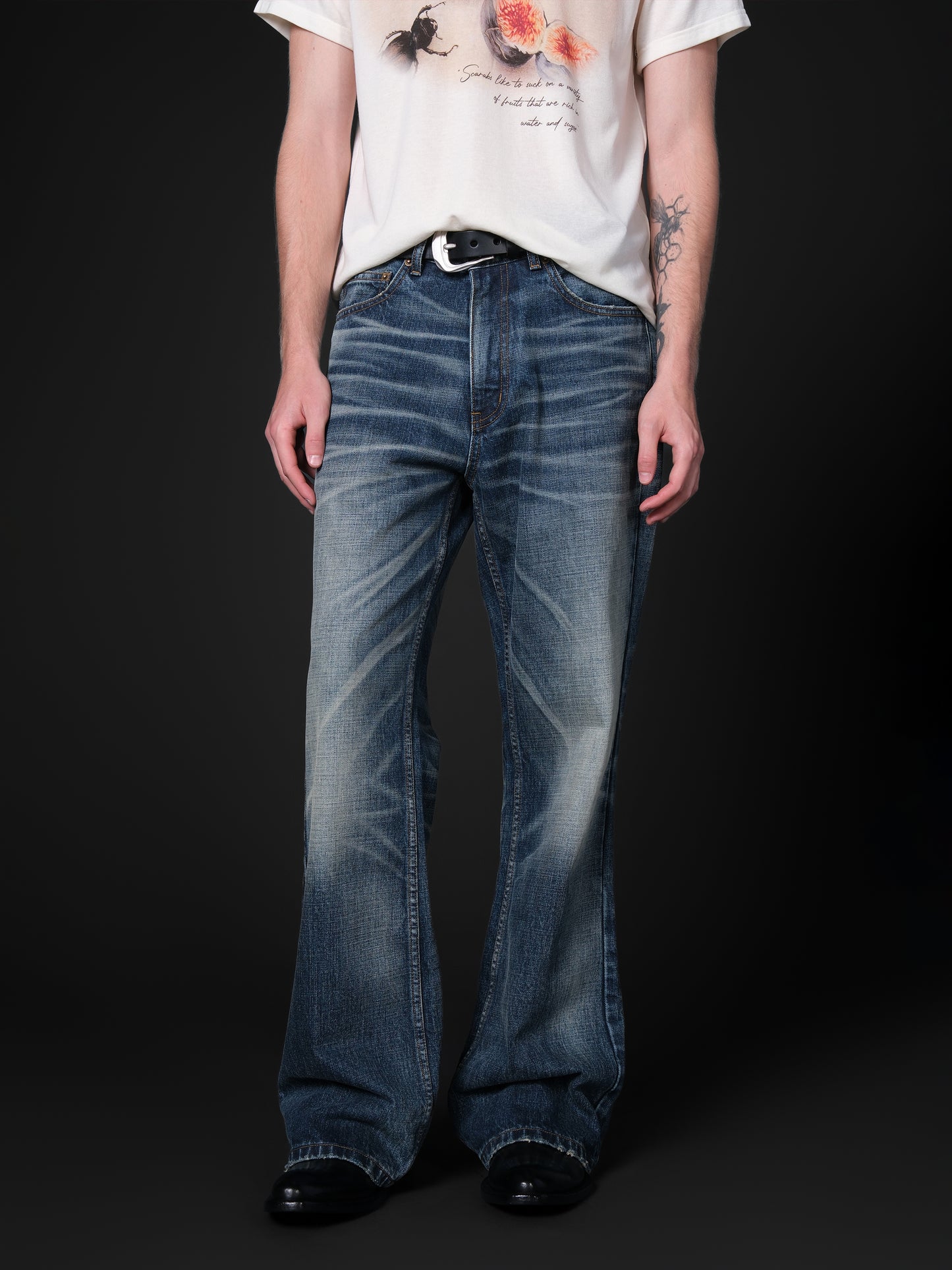 Washed distressed flared jeans