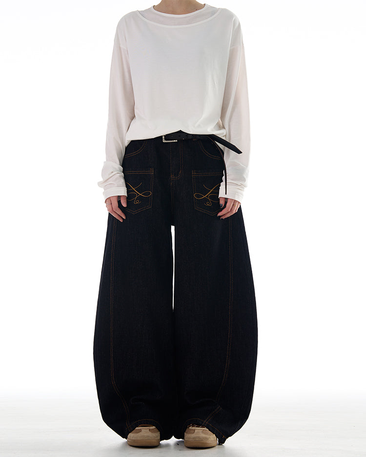 Reverse pocket design scimitar jeans