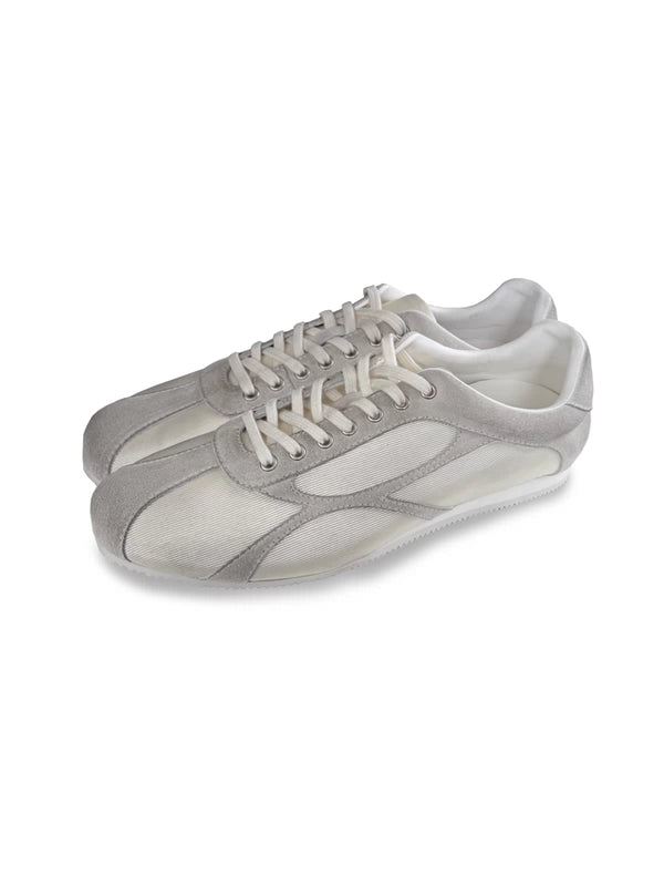 Shoes with a satin and suede combination design