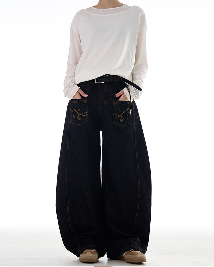 Reverse pocket design scimitar jeans