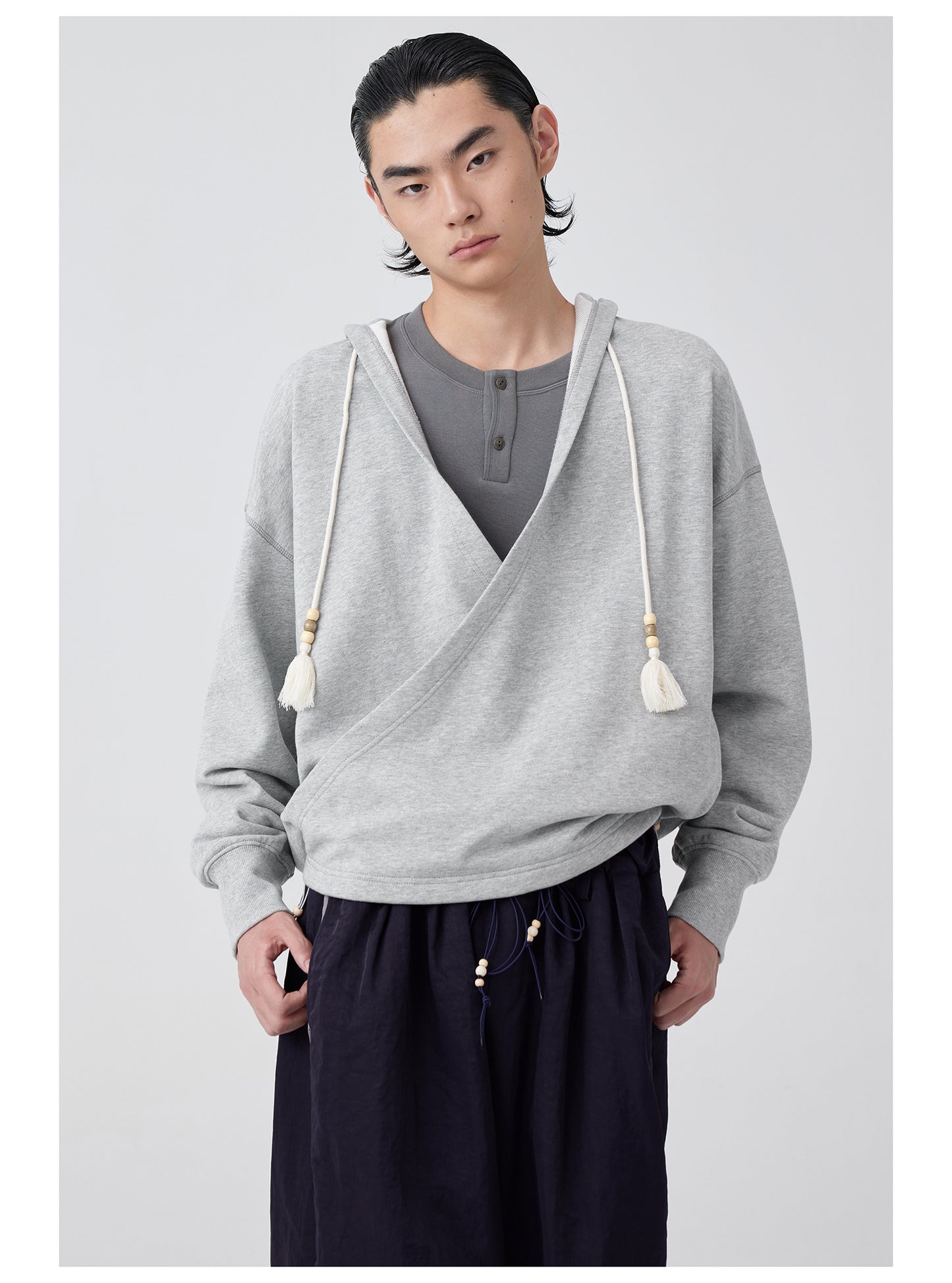 Overlap slant placket hooded sweatshirt