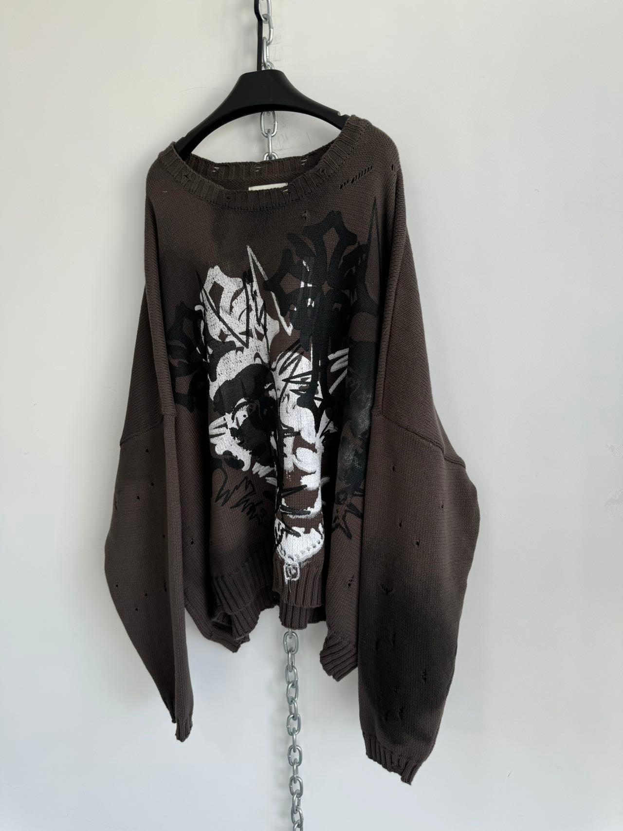 Damaged loose printed sweater