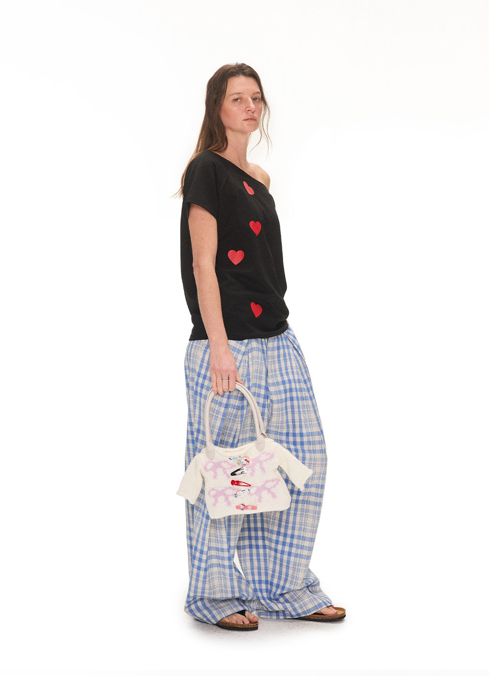 Handbag with a knitted ribbon