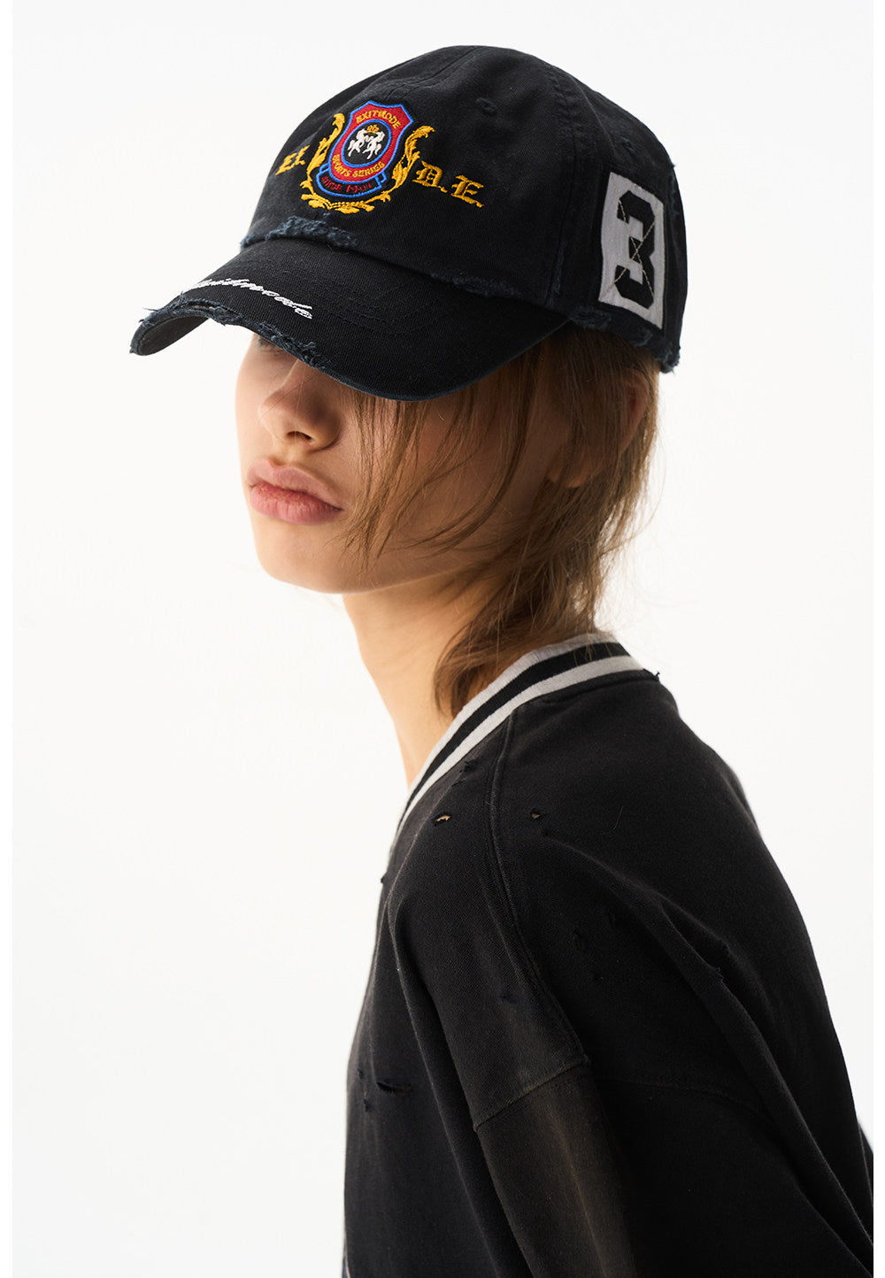 Wash-treated cap with embroidered patch