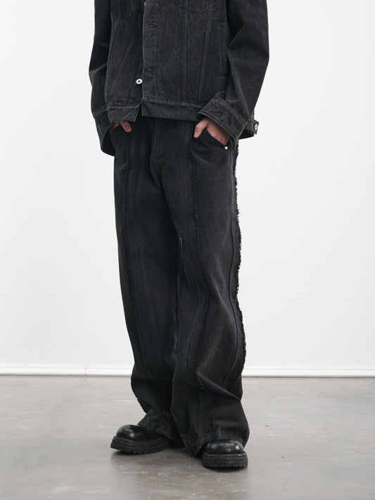 Loose-fit distressed jeans