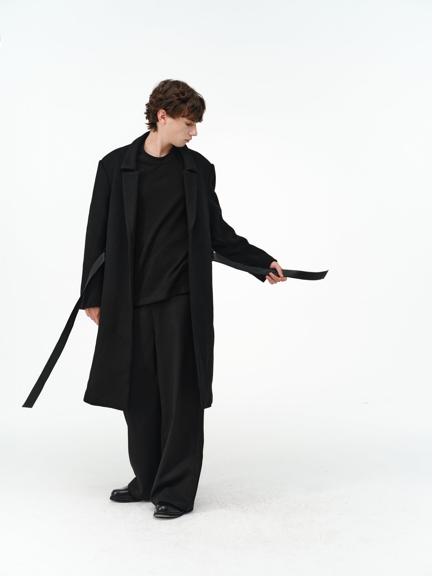 Overcoat with a leather belt