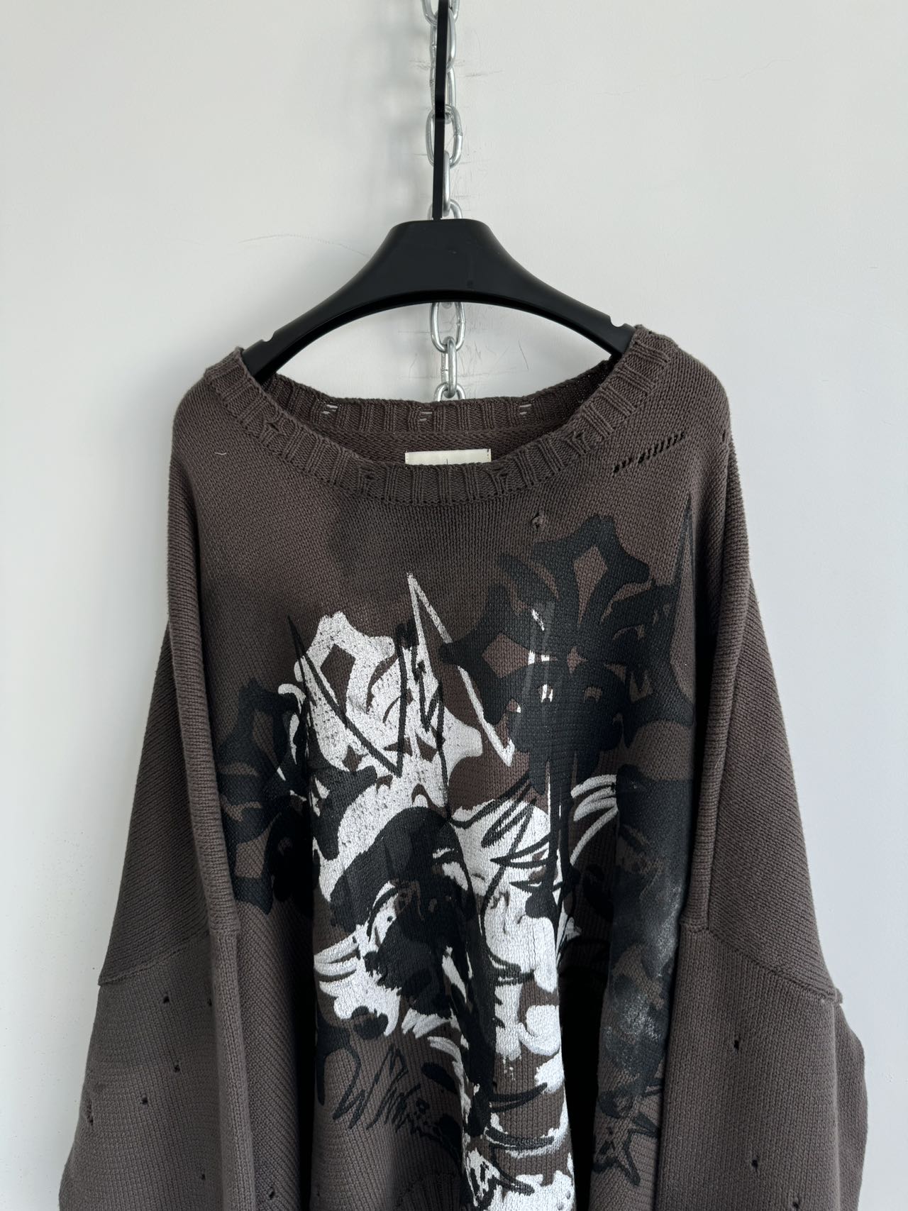 Damaged loose printed sweater