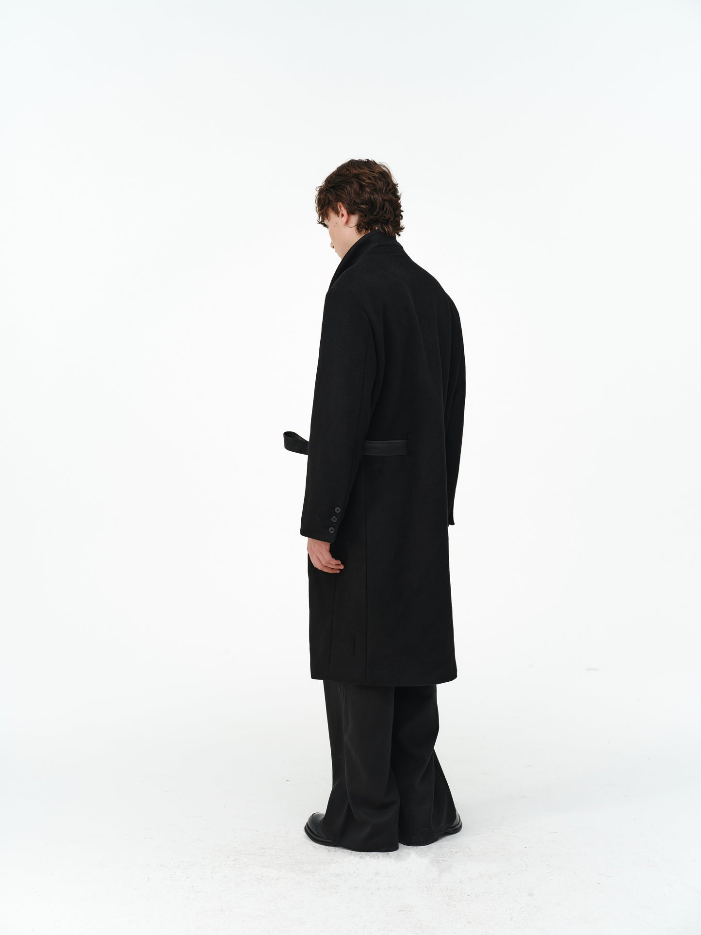 Overcoat with a leather belt