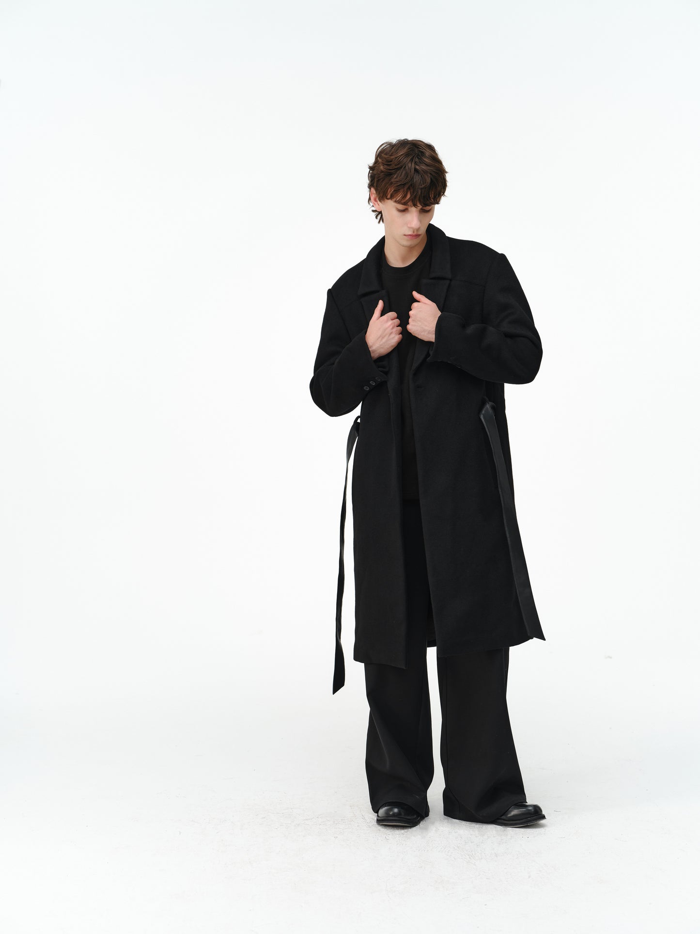Overcoat with a leather belt