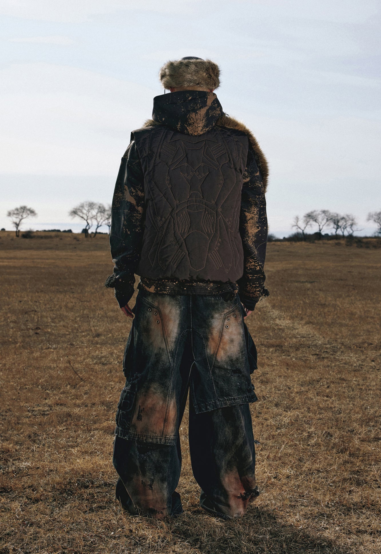 Armor stitch embroidered down vest