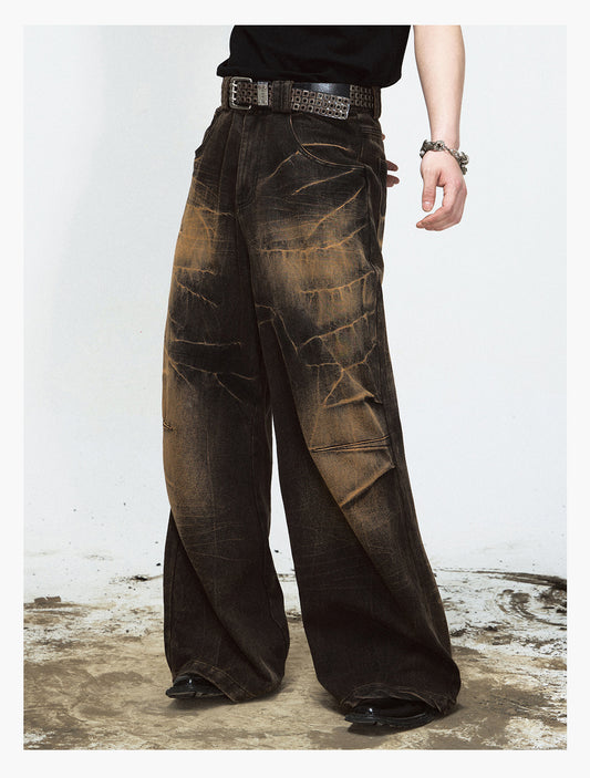 Mud-dyed wide-leg jeans