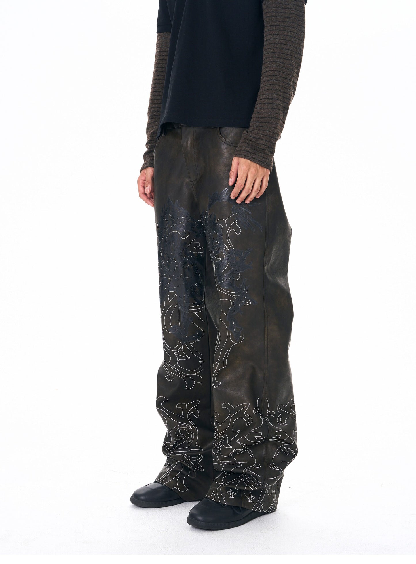 Hand-embroidered leather pants