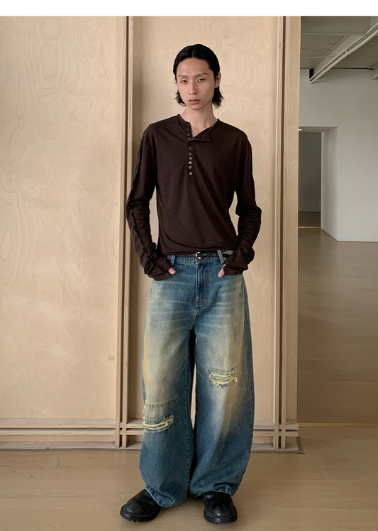 Mud-dyed wide-leg jeans 