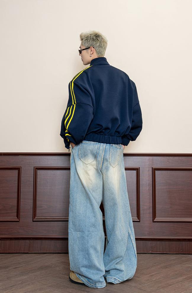 Street-washed pleated jeans