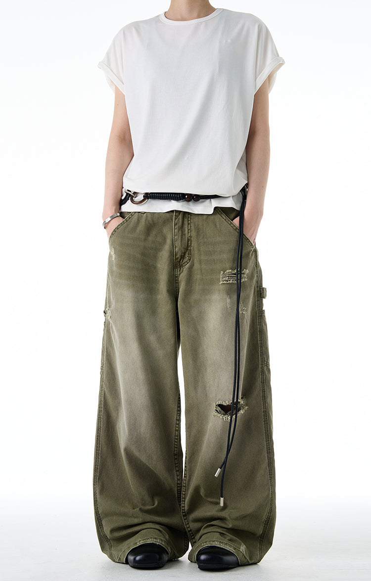 Damaged wash gradient jeans