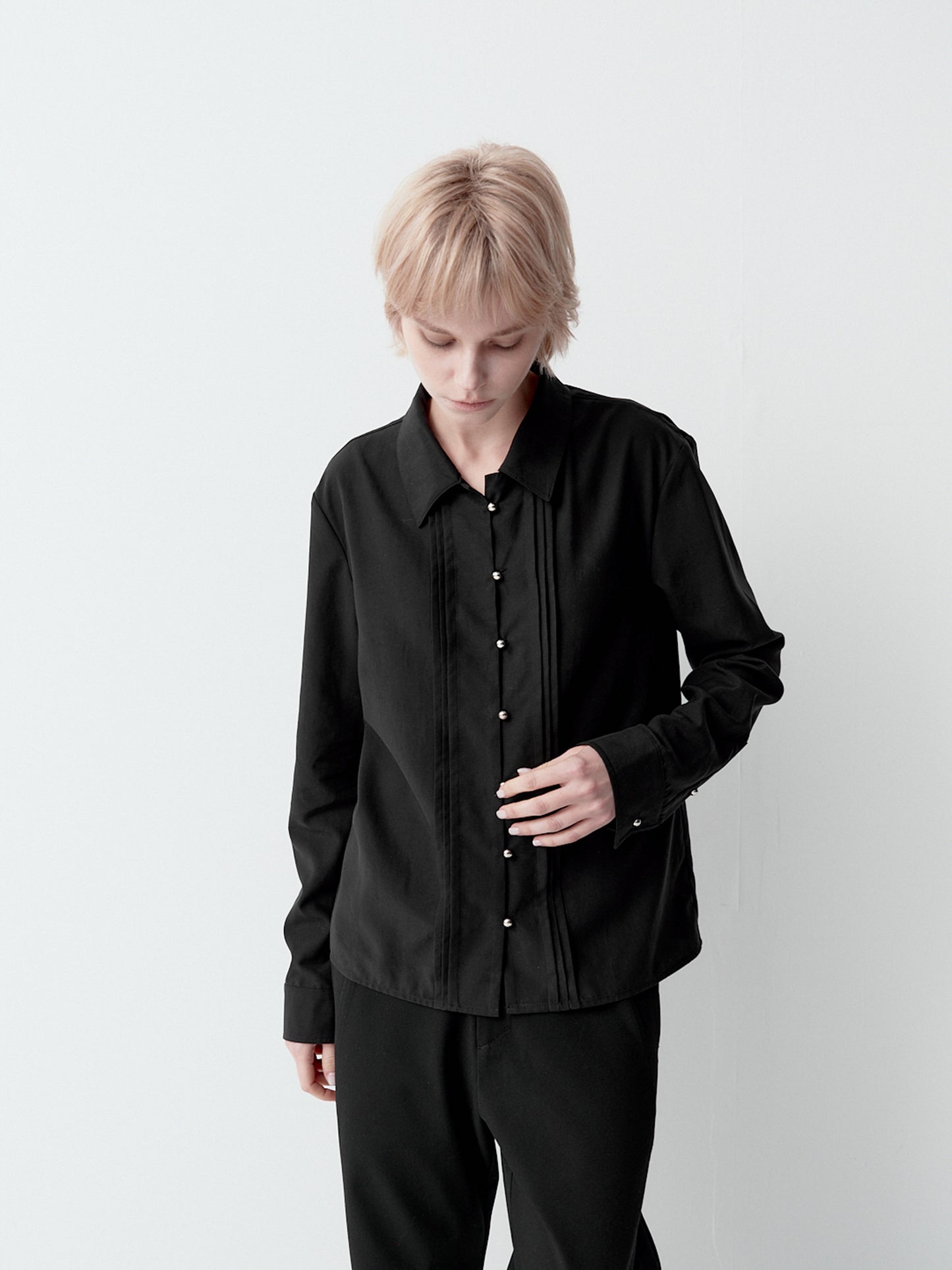 Shirt with metal buttons