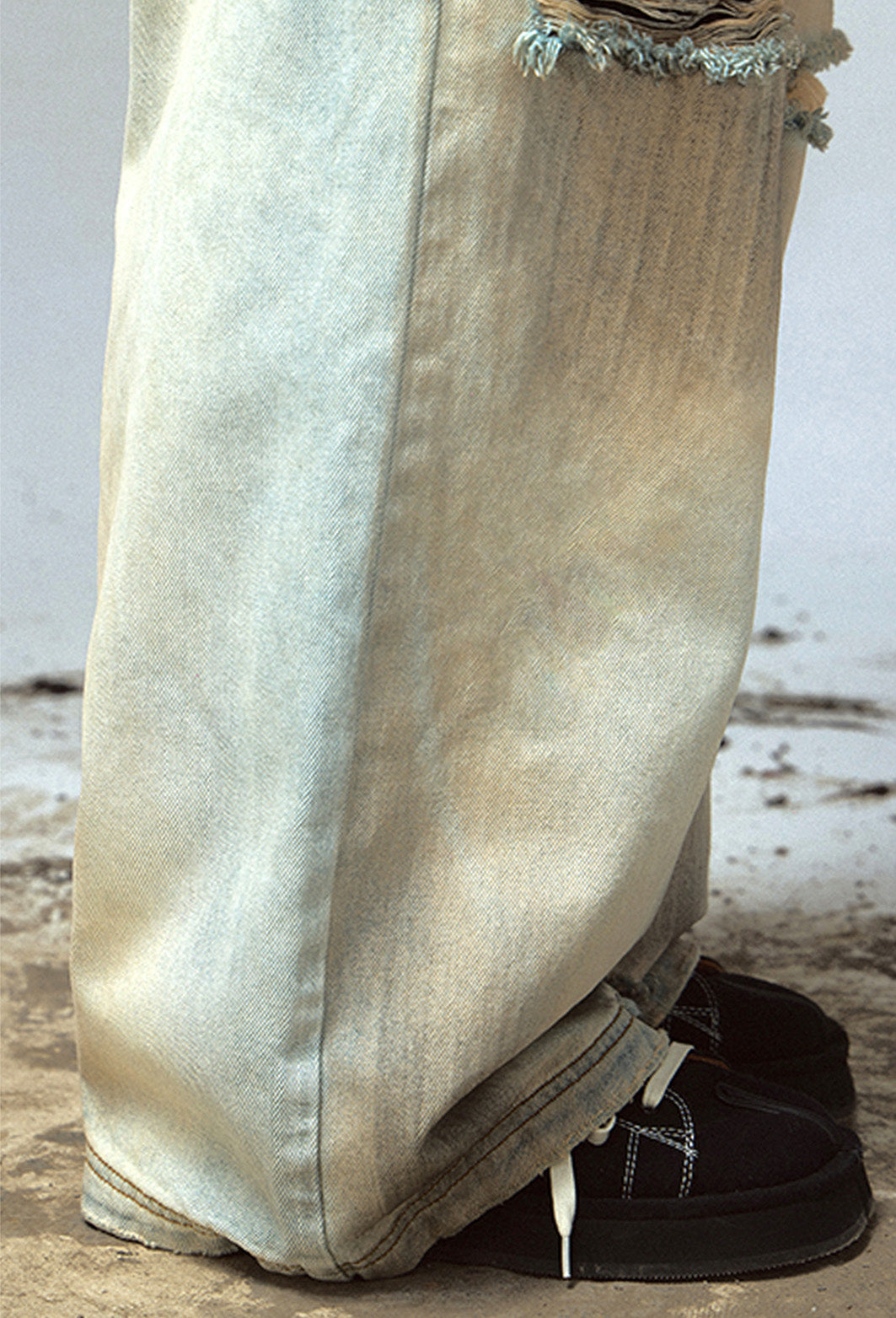 Mud-dyed washed straight jeans